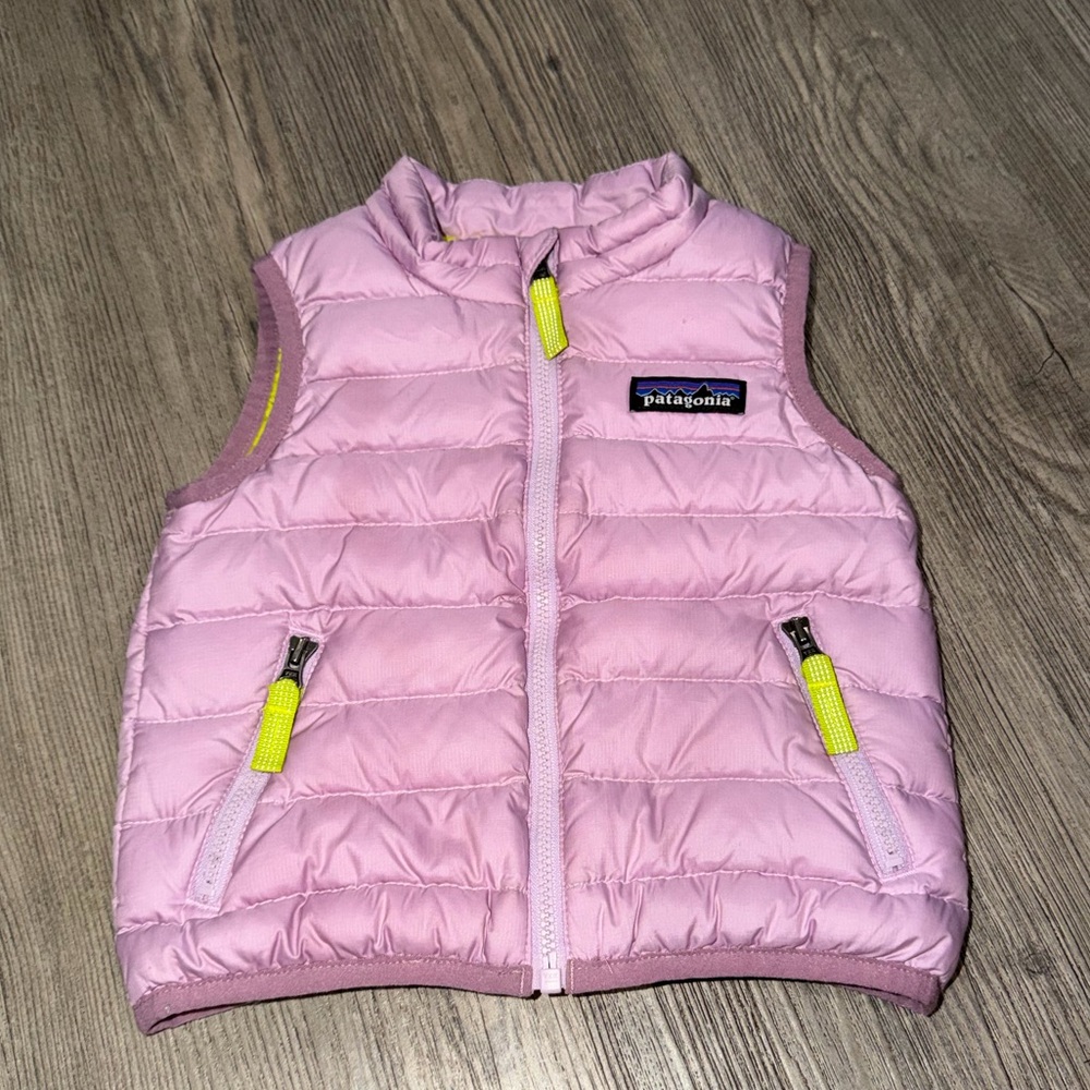 Patagonia lilac puffer vest with neon yellow lining